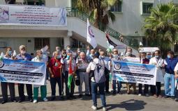وقفة احتجاجية للطواقم الصحية رفضا للتقاعد المالي- غزة