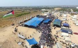 رفع العلم الفلسطيني في مخيم العودة شرق غزة