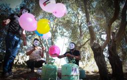 تجهيز البالونات الحارقة على حدود غزة - أرشيفية