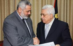 الرئيس محمود عباس ورئيس حركة حماس إسماعيل هنية