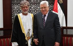 محمود عباس والرئيس العماني
