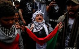 فلسطينية تشارك في يوم الأرض شرق غزة