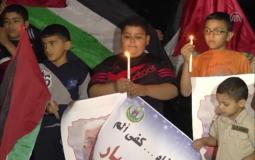 أطفال في غزة يطالبون برفع الحصار عن غزة -ارشيف-
