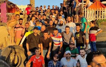 شاب غزي ينفذ رحلة لـ170 شاب من مخيم البريج