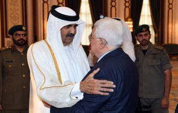 الرئيس محمود عباس والأمير القطري حمد بن خليفة