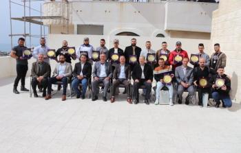 صورة تكريم أبطال بطولة فلسطين لمصارعة الذراعين