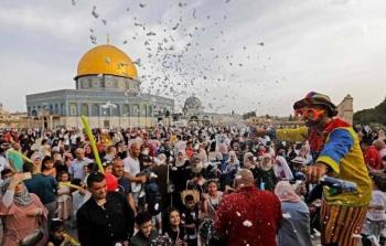فلسطينيون يحنفلون بحلول عيد الفطر - توضيحية