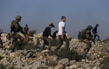 مستوطنون بحماية جيش الاحتلال الاسرائيلي - ارشيف
