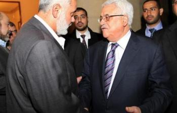 الرئيس الفلسطيني محمود عباس ورئيس حركة حماس إسماعيل هنية