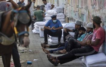 عمال غزة يتقاضون 700 شيكل أو أقل