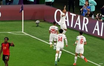 احتفال لاعبي المنتخب المغربي بالهدف الاول في شباك بلجيكا.jpg