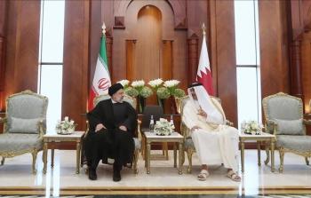 الرئيس الايراني وأمير دولة قطر.