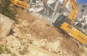 الاحتلال يهدم مخبزا في مخيم شعفاط 