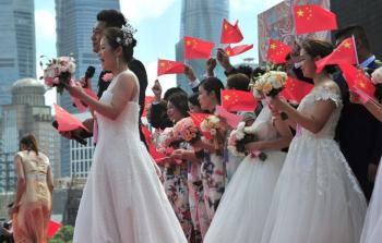 الصين تقدم مكافأة لمن يتزوج عروساً عمرها 25 عاماً أو أقل (الزواج)
