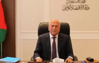 وزير الاقتصاد الوطني محمد العامور