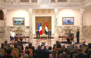 السيسي وماكرون خلال اللقاء