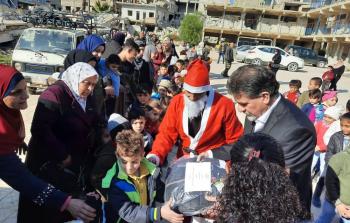 توزيع مكرمة الرئيس على طلبة المدارس- مخيم اليرموك