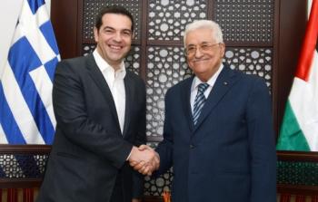 الرئيس عباس أثناء لقاء رئيس الوزراء اليوناني