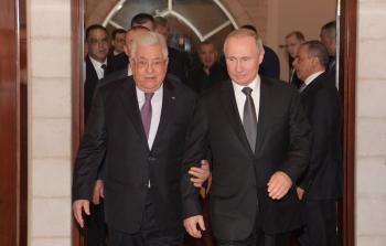 الرئيس محمود عباس ونظيره الروسي بوتين