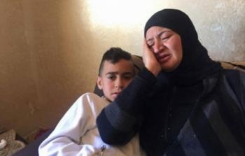 فلسطينية تودع ابنها الشهيد بالضفة