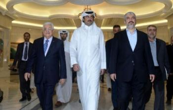 الرئيس عباس ومشعل وأمير قطر