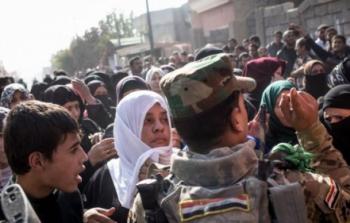 مدنيون يحاولون الخروج من أحياء الموصل الشرقية