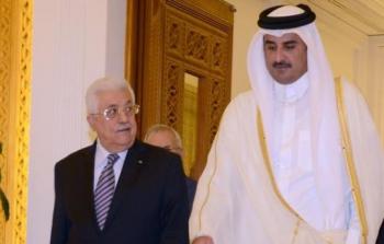 الرئيس محمود عباس وأمير قطر -ارشيف-