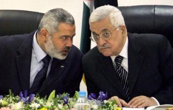 الرئيس الفلسطيني محمود عباس ورئيس حركة حماس اسماعيل هنية