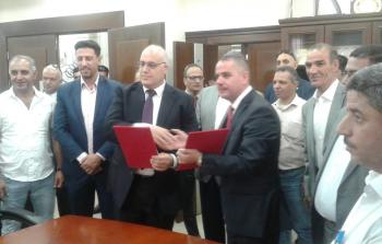 وزير العمل نصري أبو جيش يوقع سلسلة اتفاقيات