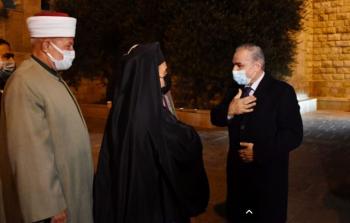 محمد اشتية خلال مشاركته في عشاء عيد الميلاد 