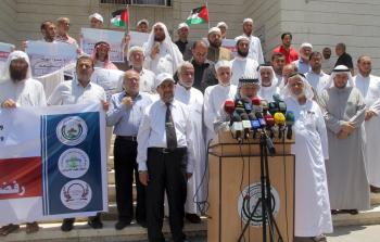 مؤسسات دينية بغزة تنظم وقفة للعلماء رفضاً للاعتداء على باب الرحمة