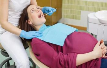 المرأة الحامل عند طبيب الأسنان - ارشيفية