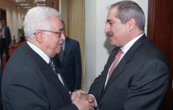الرئيس محمود عباس و نائب رئيس الوزراء وزير الخارجية وشؤون المغتربين الاردني ناصر جودة.