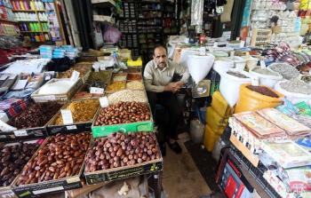 بائع في أحد الأسواق الشعبية في غزة -تعبيرية-