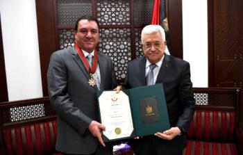 الرئيس محمود عباس واللواء عاطف سلامة