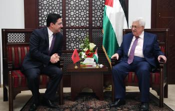 الرئيس محمود عباس خلال لقائه وزير الخارجية المغربي ناصر بوريطة