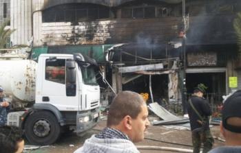 الاحتلال يحرق محل صرافة وسط رام الله
