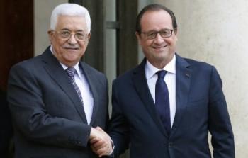 الرئيس الفلسطيني محمود عباس ونظيره الفرنسي هولاند