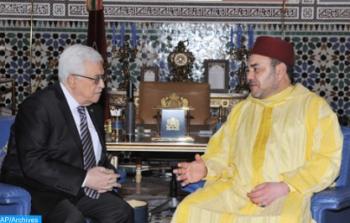 ملك المغرب والرئيس عباس خلال لقاء سابق