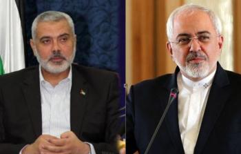 وزير خارجية إيران محمد جواد ظريف ورئيس حركة حماس إسماعيل هنية
