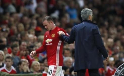  جوزيه مورينيو(يمين) وواين روني(يسار)