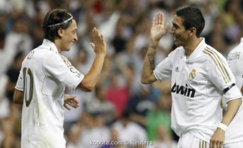 ديماريا وأوزيل حينما كانا يلعبان في ريال مدريد