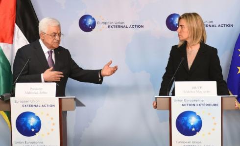 الرئيس عباس خلال مؤتمر صحفي مع  فديريكا موغيريني