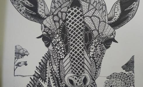 طفلة فلسطينية تنهي لوحة مانديلا في وقت قياسي