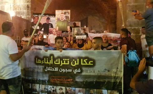 عكا: مسيرة مشاعل دعماً لمعتقلي الهبة الشعبية