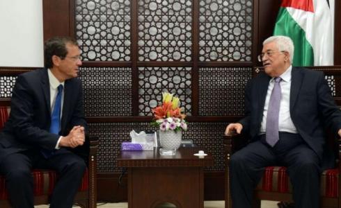 الرئيس محمود عباس ونظيره الاسرائيلي هرتسوغ - ارشيف