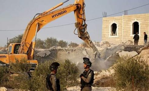 الجرافات الإسرائيلية تهدم منزل فلسطيني - أرشيفية