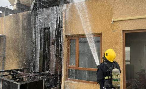 اخماد حريق في مصرف بالعراق.