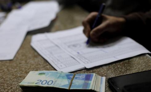 إنهاء خلاف مالي بين تاجرين وشركة بقيمة 777 ألف شيكل في قطاع غزة