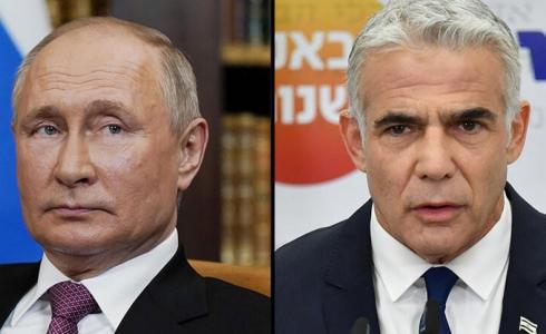 رئيس الوزراء الإسرائيلي يائير لابيد والرئيس الروسي فلاديمير بوتين